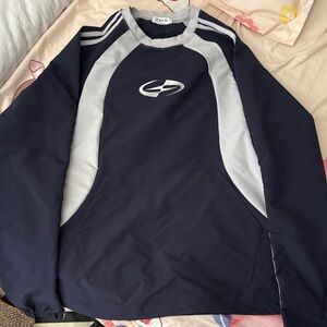 Vintage-style navy sporty long sleeve top with adjustable hem